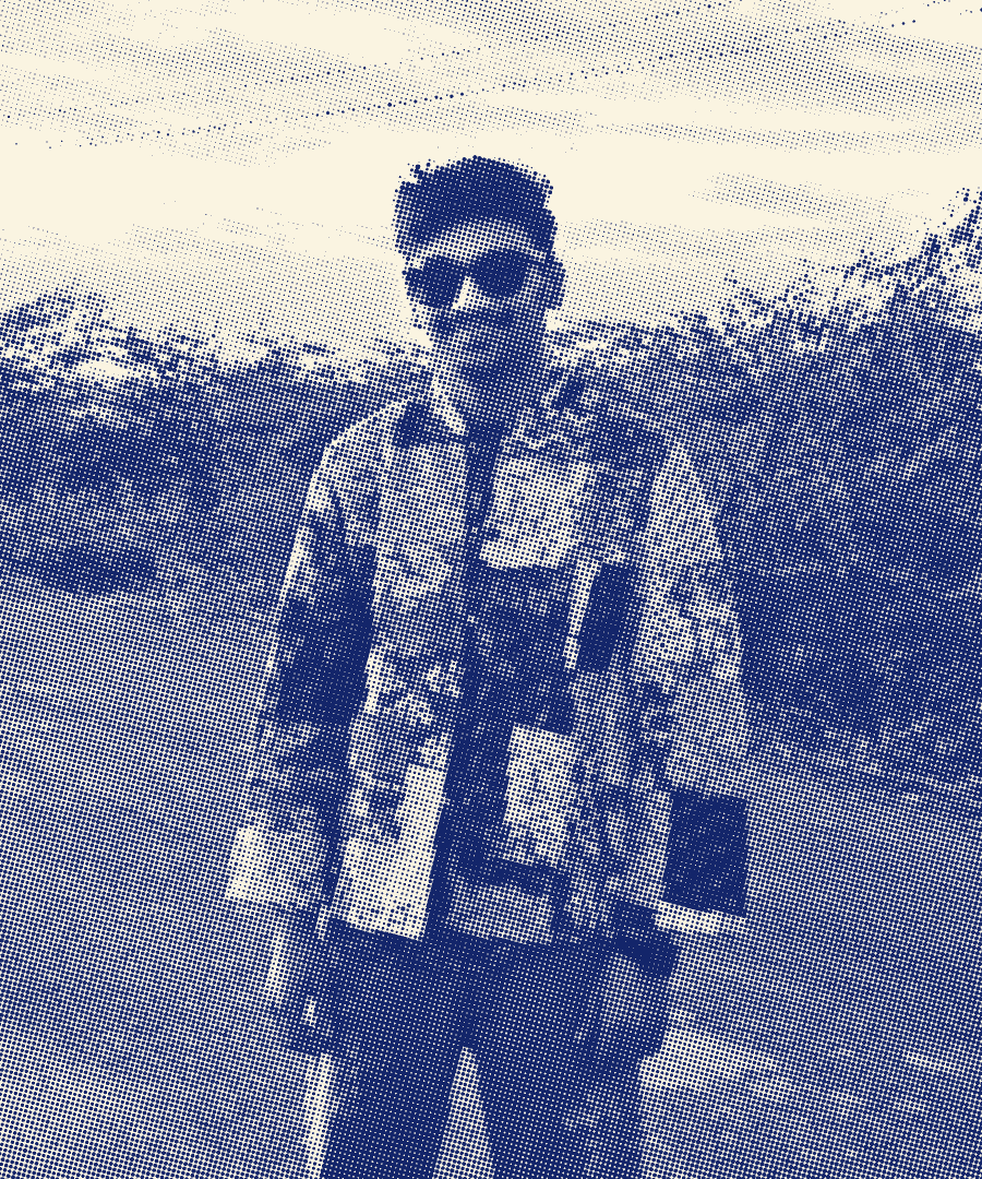 Krishna Jain, in a patchwork jacket at sunset